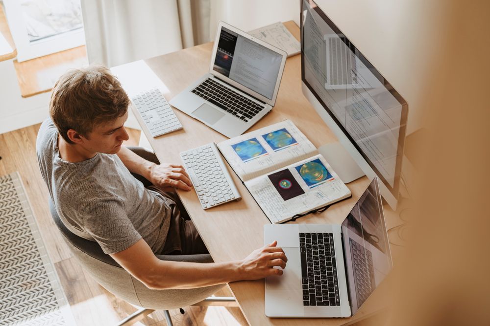 A Silver Rabbit developer building at a multi-monitor workstation